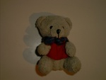 A close-up of the cute teddy bear on my desktop