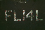 Voila, "FLI4L" in crown caps