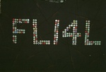 Another shot of the "FLI4L" in crown caps